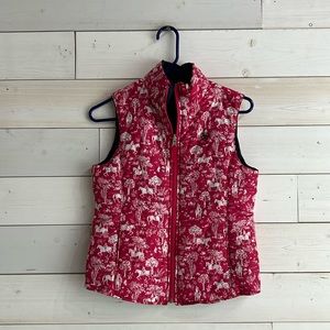 Ariat youth vest. Horse print in hot pink and navy. Reversable